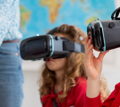 girls using virtual reality headsets