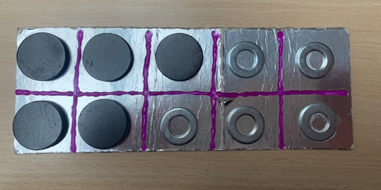 Game using washers and magnets 