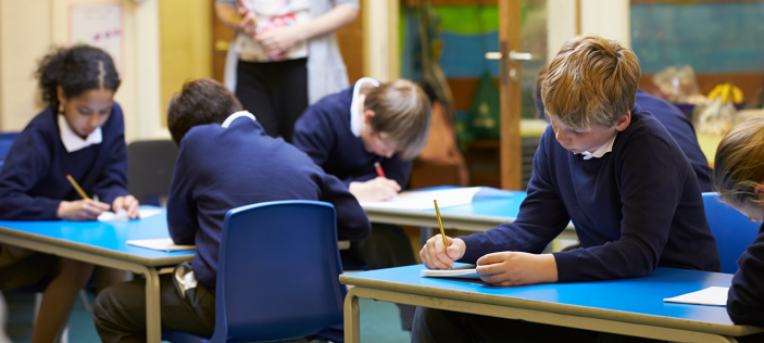 School children sat at desks