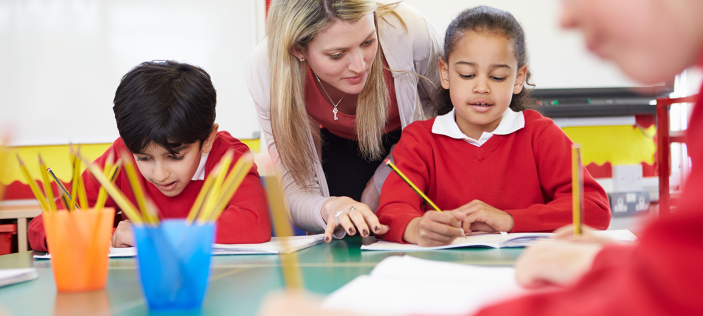 children with teacher reading