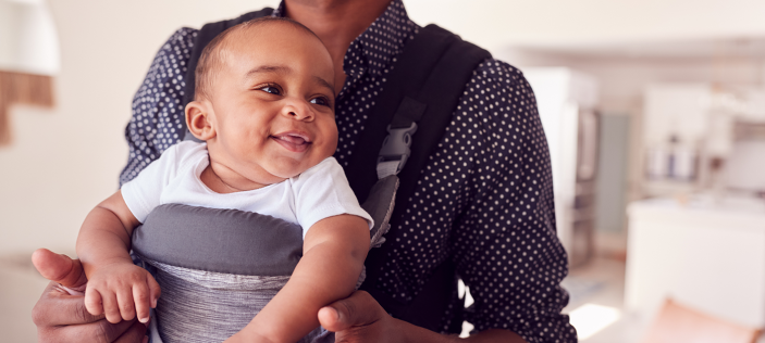 Early Years child in baby carrier