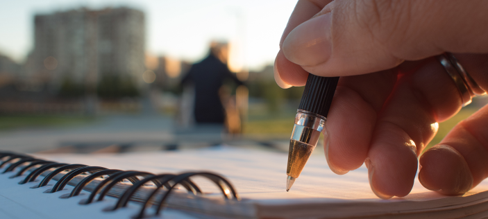 Pen writing in book