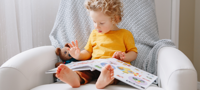 Early Years child reading 