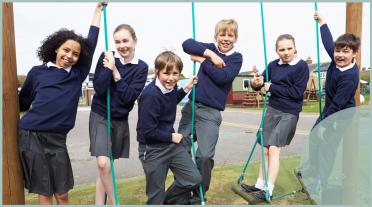 group of children on playground equipment