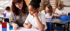 children with teacher reading