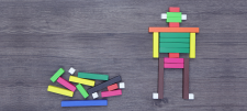 Inspire me! The CPA approach: using Cuisenaire Rods to explore fractions Cuisenaire Rods on grey background