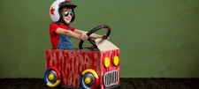 Putting your school in the driving seat for the Year 4 Multiplication Tables Check Boy riding in a small play-car